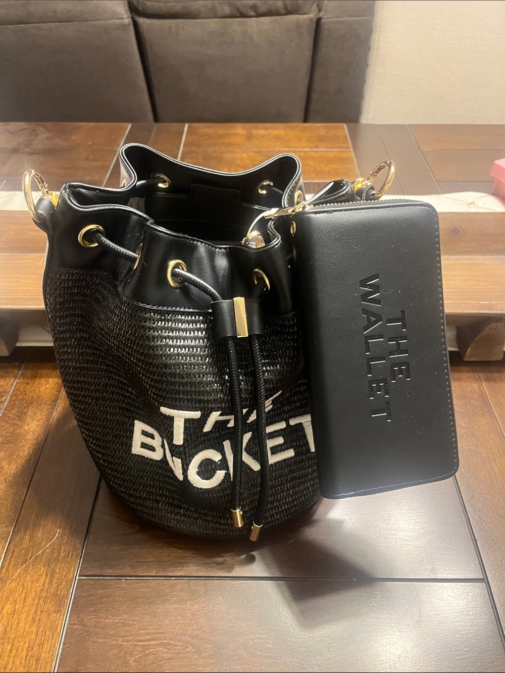 Black 'The Bucket' Woven Drawstring Hobo Bag with matching wallet